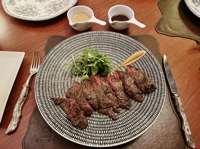 Butchers cut steak and sauces from from SKIRT restaurant at W Hotel Sentosa Cove